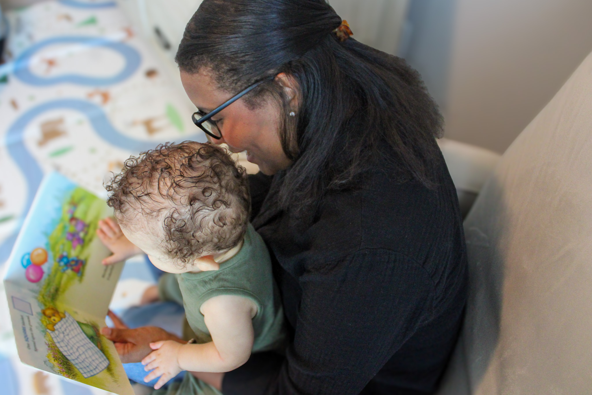 Mother reading with young child